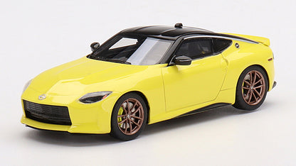[ Back-order ] TSM TSM430644 1:43 Nissan Z Protospec 2023 Ikazuchi Yellow LHD model car