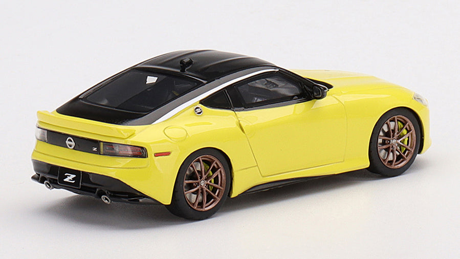 [ Back-order ] TSM TSM430644 1:43 Nissan Z Protospec 2023 Ikazuchi Yellow LHD model car