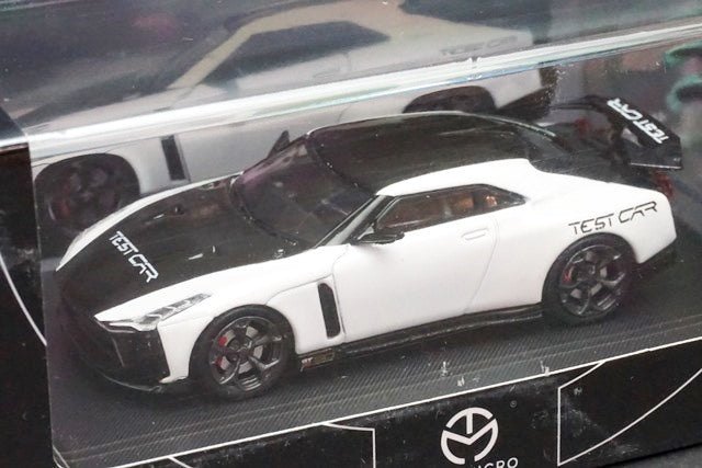 TM Time Micro 1:64 Nissan GTR R50 Test Car White/Black with Figure model car