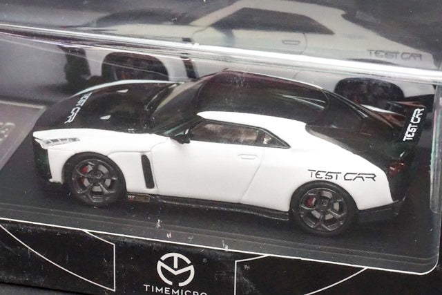 TM Time Micro 1:64 Nissan GTR R50 Test Car White/Black with Figure model car