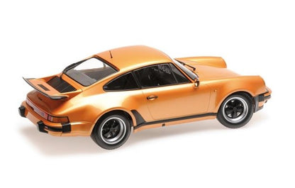 125066110 MINICHAMPS 1:12 Porsche 911 Turbo 1977 Orange Metallic