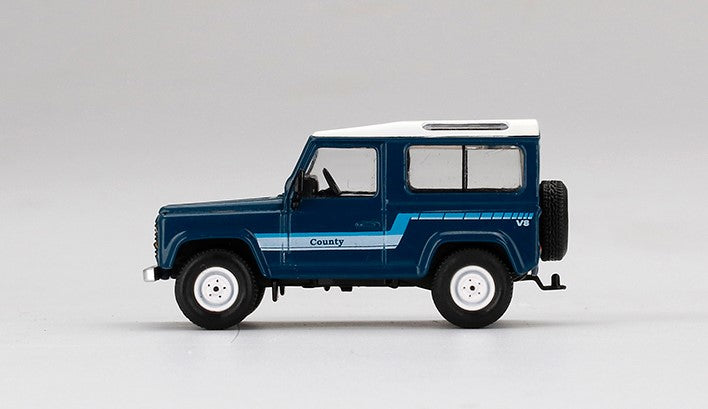 MGT00353-L TSM MINI-GT 1:64 Land Rover Defender 90 County Wagon Stratos Blue LHD